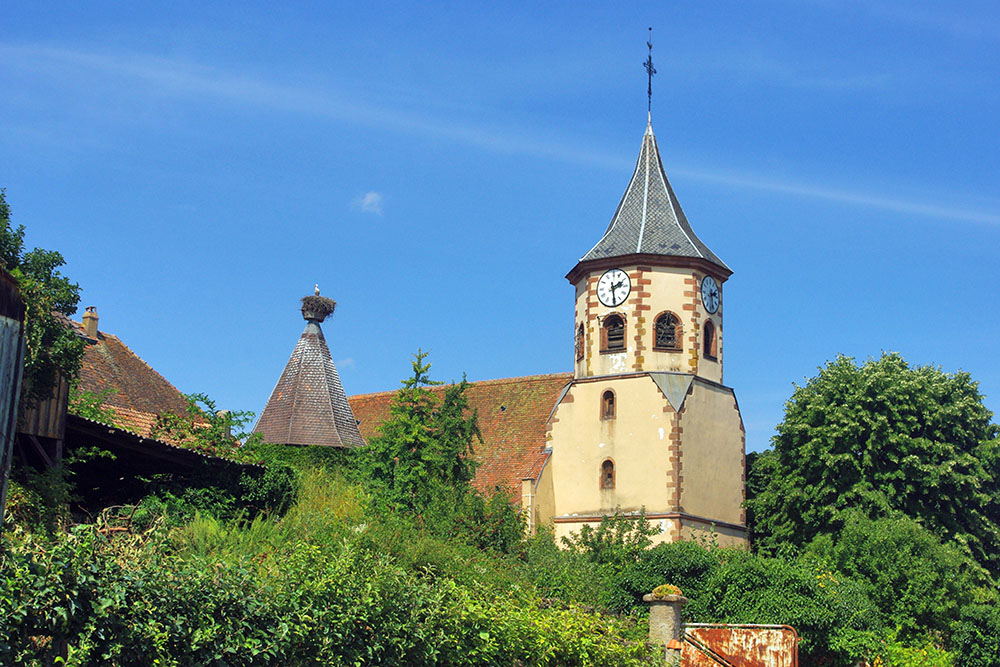 St Ulrich Church in Zellenberg and the stork nest